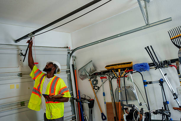 Professional Garage Door Panel Replacement technician working in Upland, IN